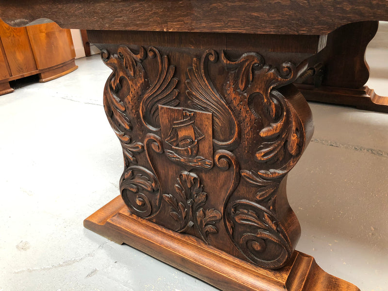 A beautiful French oak, Spanish style parquetry top extension table, with amazing carving and lovely details in very good condition.