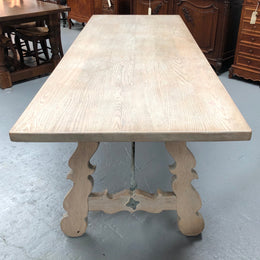 Limed French Oak Farmhouse table with decorative iron base. In good original detailed condition.