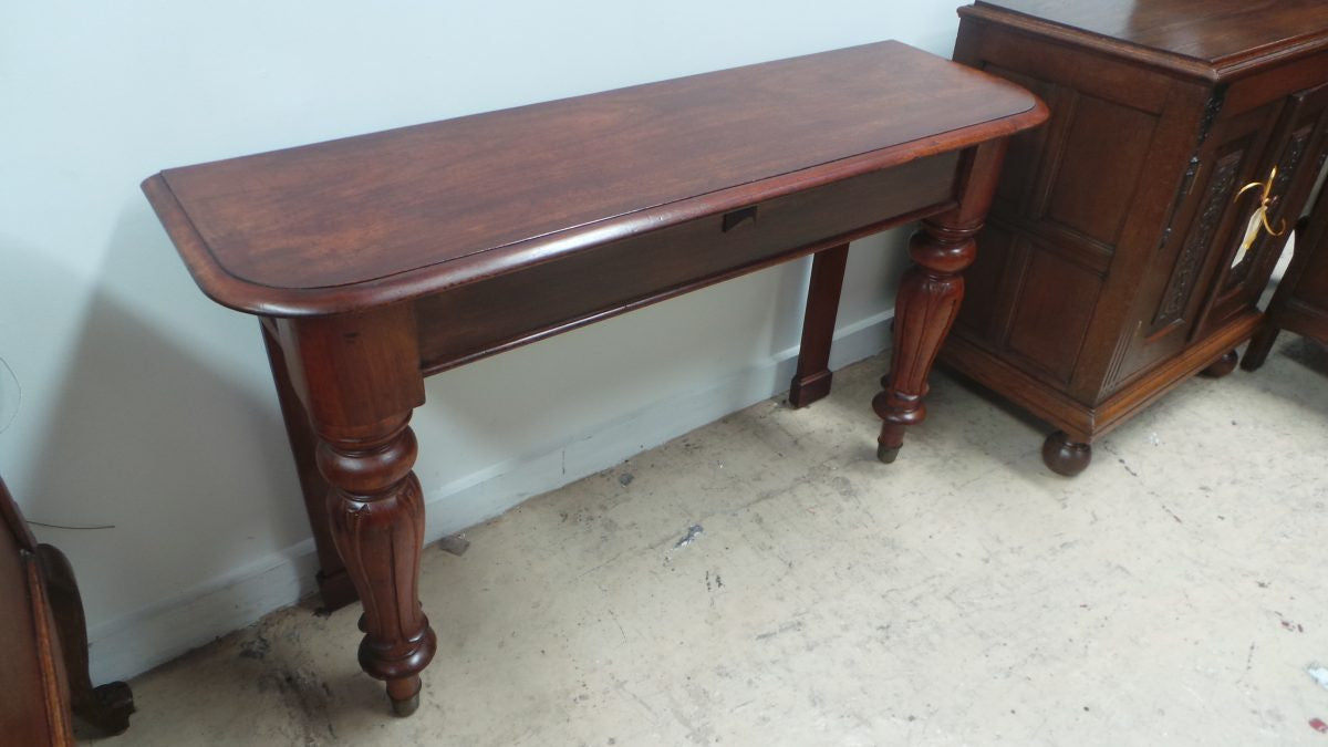 A Matching Pair Antique Console Tables