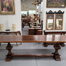 French style reclaimed Elm Farmhouse table with stretcher base and amazing carving underneath. Table can sit 10-12 people and is in good original detailed condition.