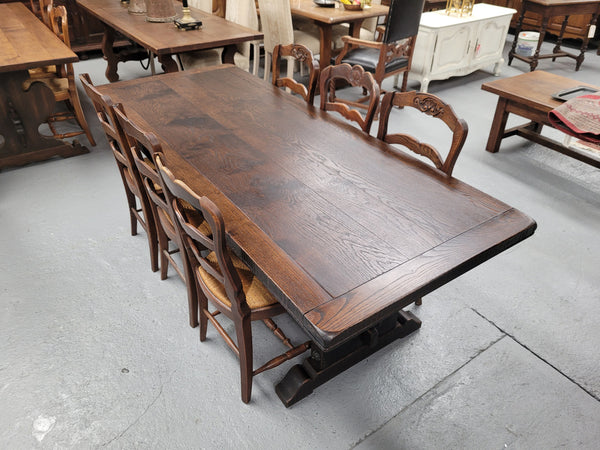 Stunning French dark Oak refectory style dining table. It has been sourced from France and is in good original detailed condition.