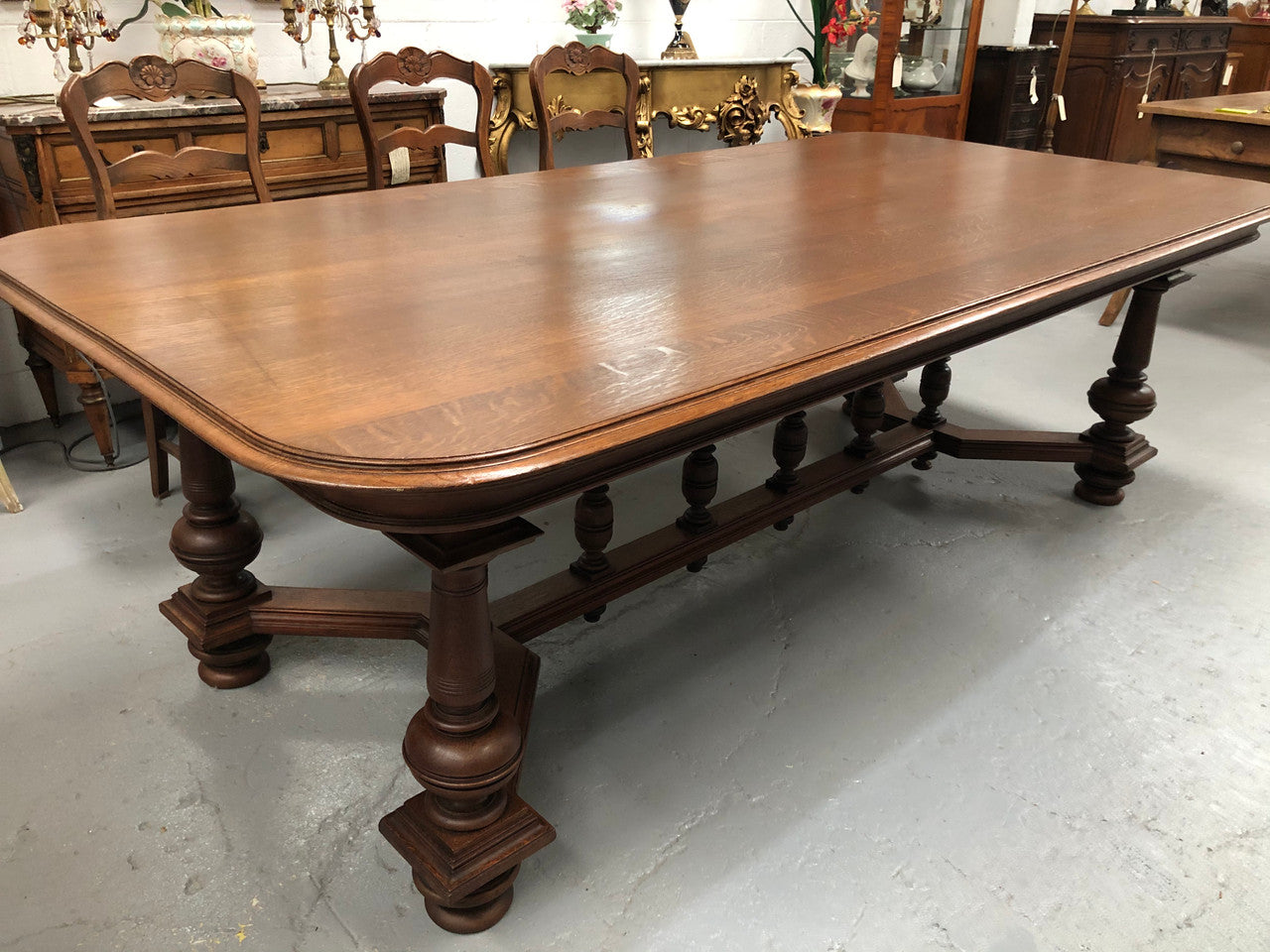 Large French Oak 19th century Henry II style dining table. It can seat 8 very comfortable and being very wide at 119 cm there is plenty of space to sit 10. In good original detailed condition.