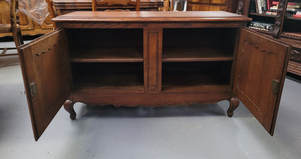 A hard to find Louis XV style French two door cabinet which would make an ideal TV cabinet. It has been sourced from France and in good original detailed condition.