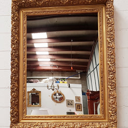 Large French Antique 19th century ornate gilt framed mirror. Circa 1880 and it is in very good original condition.