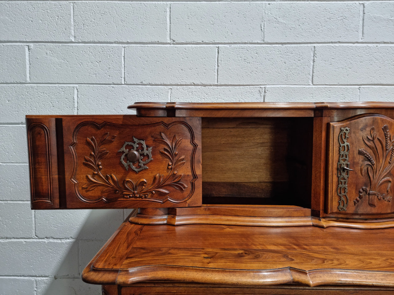 Stunning 19th Century French Walnut Buffet à Glissant from Provence, France. This is an exceptional charming piece and very functional with plenty of storage space, two large cupboards at the bottom, two drawers in the middle and two sliding doors either side at the top and finished off with a small central cupboard. In good original detailed condition.