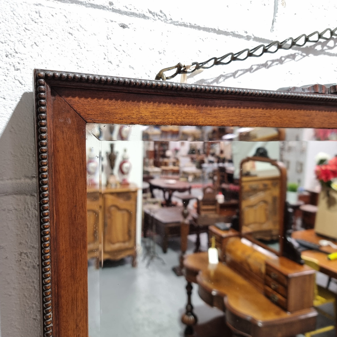 Attractive Edwardian rectangular wall mirror, with carved detail and beaded edge. Retaining it's original bevelled edge mirror and is in good original condition.