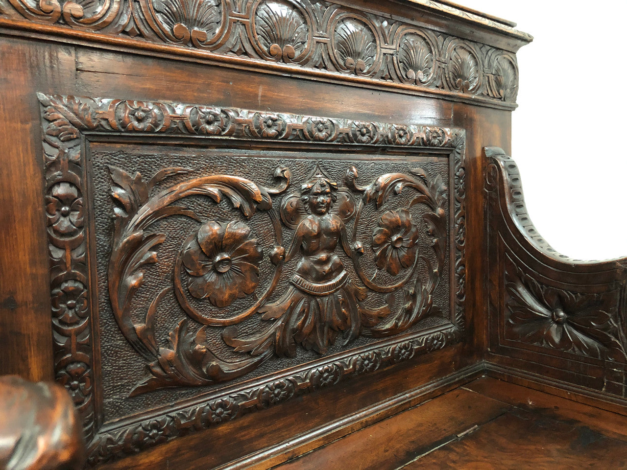 Beautifully carved 19th century gothic style hall seat. The seat lifts up for storage underneath and in very good condition.
