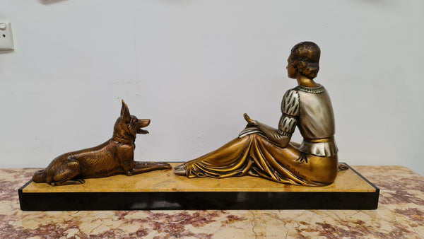 Art Deco sculpture of lovely seated lady with German Shepherd signed by signed by H.Molins. In good original detailed condition.