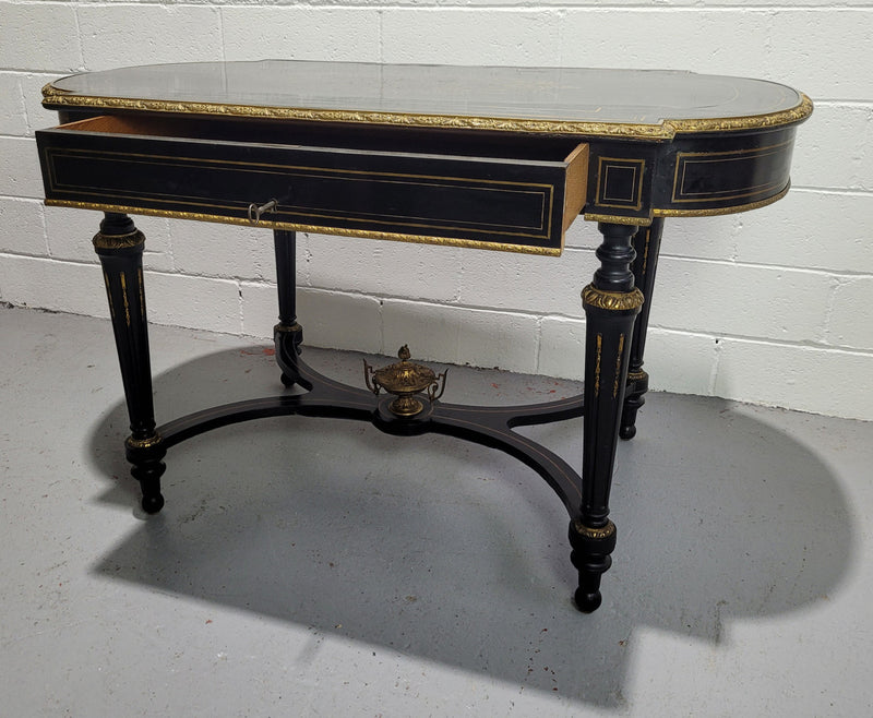 19th Century Napoleon III boulle ebonized centre table. Beautiful decorative mounts and has a drawer on one side. In good restored condition.