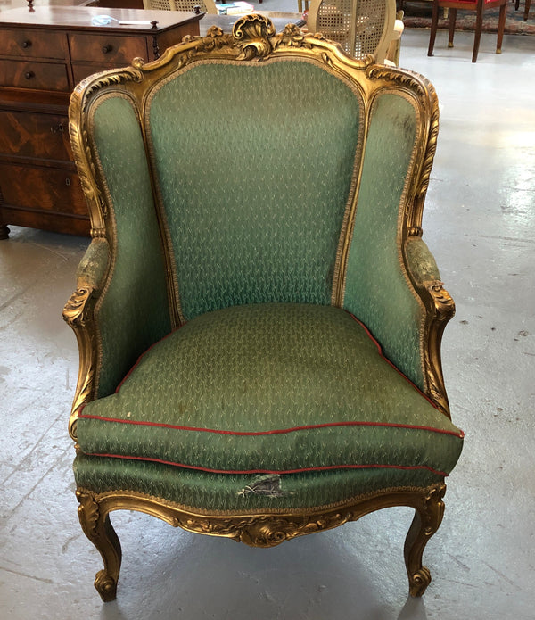 Charming Louis XV glided Walnut chair/carved bergère. This is a very early piece from circa 1800's. It would look amazing reupholstered in a stunning fabric of your choice.