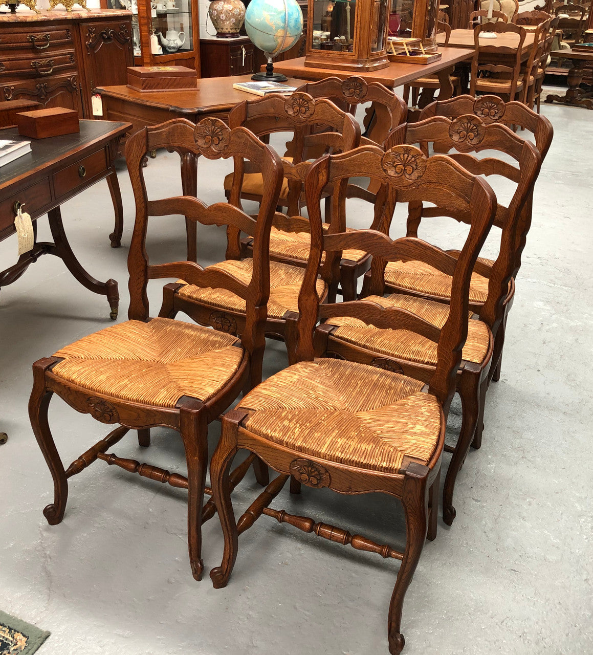Set of six French rush seat dining chairs and in good sturdy condition.