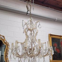 Impressive elegant ten arm French crystal chandelier that has been sourced from France. It has been fully rewired to Australian standards and is in good original working condition.