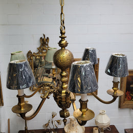 Stunning six arm French bronze chandelier. It can be used with or without shades. It has been fully rewired to Australian standards. It is in good original detailed condition.
