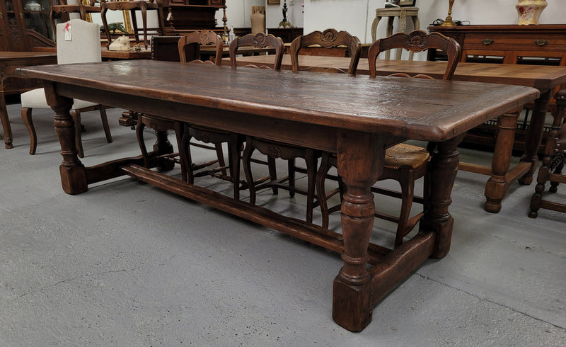 Amazing 2.65 meter French Elm Refectory dining table with loads of rustic charm. This table has been sourced from France and can comfortably seat ten people. It is in good original detailed condition.