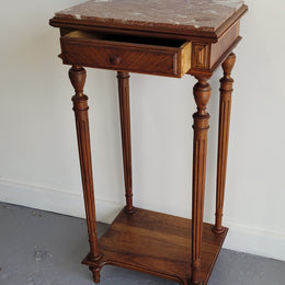 Louis XVI style Walnut lamp/side table with drawer and marble top. In good original detailed condition.