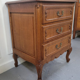 French Oak Louis XV style side drawers with lovely handles and three drawers. It has been sourced from France and is in good original detailed condition.