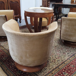 Four stunning original Art Deco Tulip shaped salon lounge chairs made specifically for the Hotel Le Malandre, Belgium  in the 1930’s. They are marked with a metal tag “Hotel Le Malandre Modele Depose”  Burl Walnut, Walnut and gold coloured velvet upholstery and rest on a thick wooden circular base it has been sourced in France and in good original condition. Included in the set is the accompanying Art Deco Walnut with glass top side table also made for Hotel Le Malandre and marked with the metal tag.  Absol