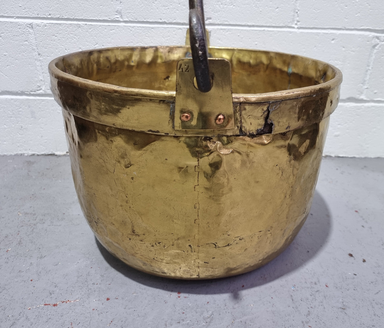Antique French brass firewood handled bucket. In good original detailed condition.