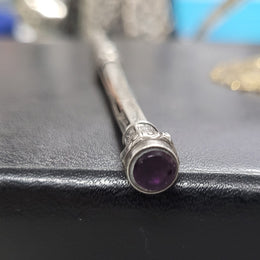 Interesting sterling silver and amethyst propelling and extending pencil. In good original condition, please view photos as they help form part of the description.