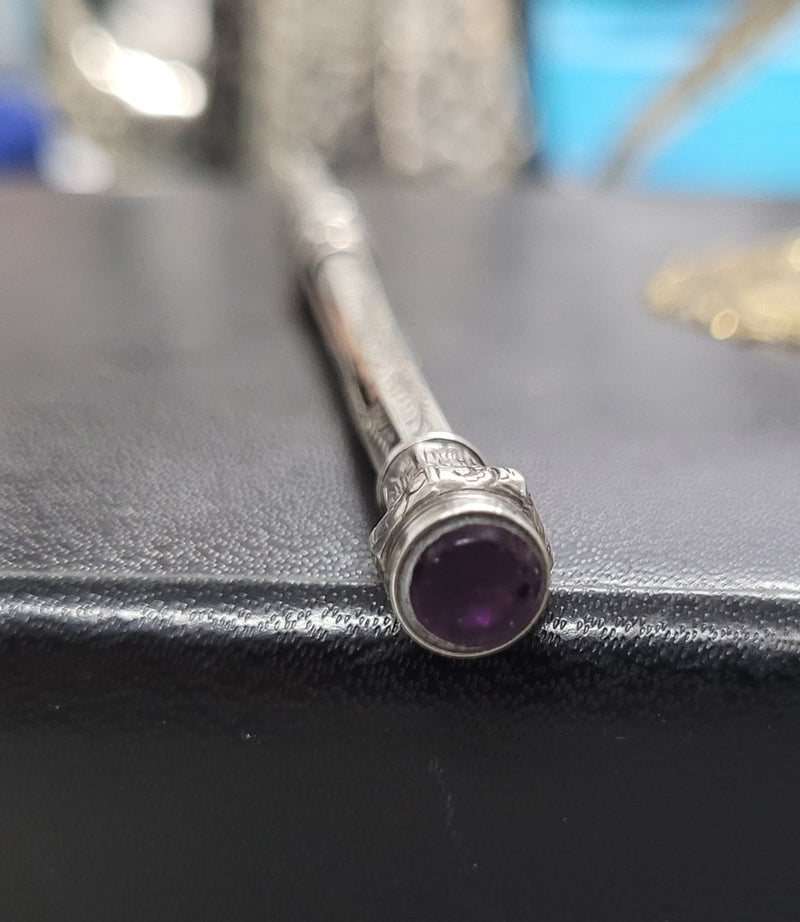 Interesting sterling silver and amethyst propelling and extending pencil. In good original condition, please view photos as they help form part of the description.