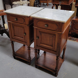 Antique French Oak Henry II white marble top bedside cabinets. They have one drawer and cupboard a long with an open shelf at the bottom. Sourced from France and in good original detailed condition.