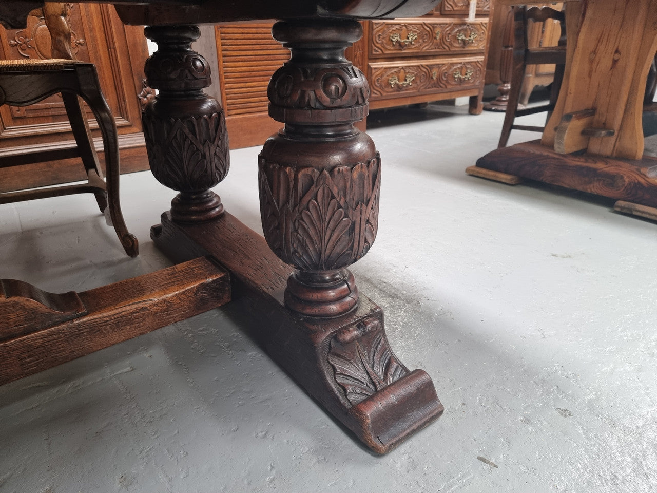 Renaissance style Oak extension table with parquetry top and twin pedestal base. The table extends by pulling out an extension leaf either side making it 287 cm long. Sourced from France and in good original detailed condition.