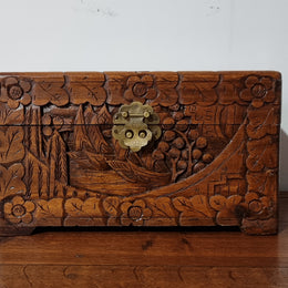Small Chinese carved camphor wood jewellery box. It is in original condition.