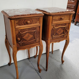 Pair French Walnut Louis XV style Bedside Cabinets with inset rouge carrera marble tops and parquetry inlay. Consisting of one drawer and one cupboard on very elegant legs. Circa: 1900's.