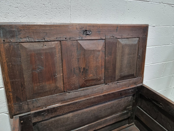 Early 19th Century French Oak carved coffer with a lift up lid for storage. A beautiful piece and in good original condition.