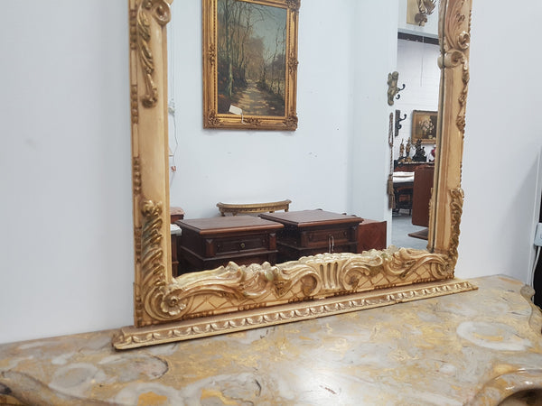 Beautifully carved Italian Rococo style painted console/hall table and mirror. An amazing coloured marble top showing sections of gold veins and is in good condition. Mantle mirror is retaining it's original mirror and showing ages spots.
