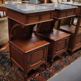 Pair of unusual transitional fruit wood marble top bedside cabinets. They have been sourced from France and are in good original detailed condition.