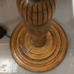 Tudor style Oak standard lamp, rewired and with foot switch. In good original condition.