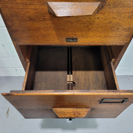 Blackwood four drawer filing cabinet in good original detailed condition.