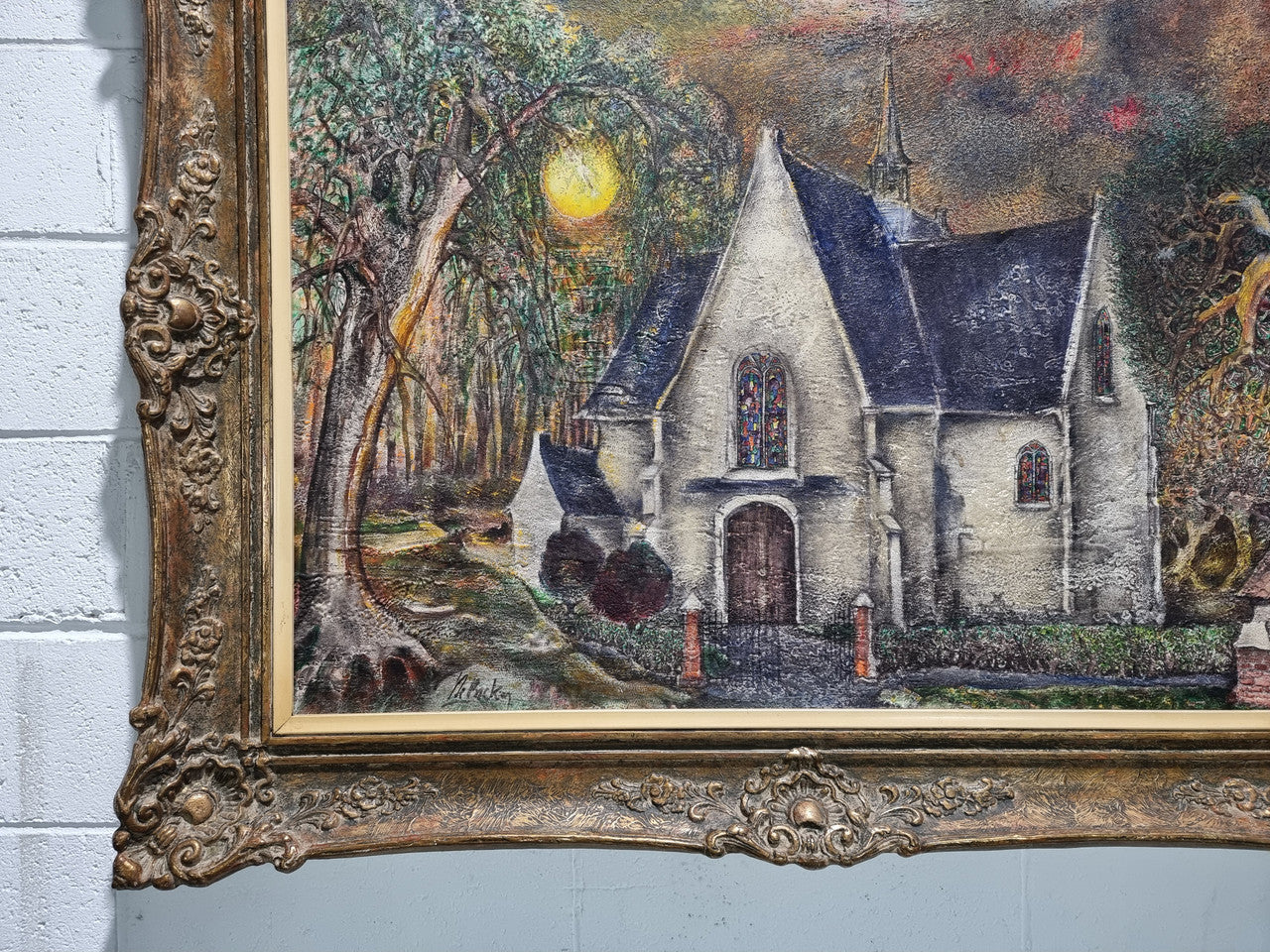 Beautiful large signed French oil on canvas painting, depicting a church/landscape in original gilt frame.