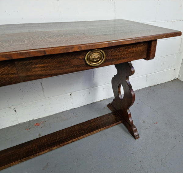 French dark Oak two drawer console table. It has loads of character and is in good original detailed condition.