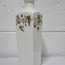 Lovely floral Wedgwood white vase with a pretty design in good condition, please view photos as they help form part of the description.