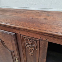 Late 18th Century French Oak carved two door sideboard. In good original detailed condition.