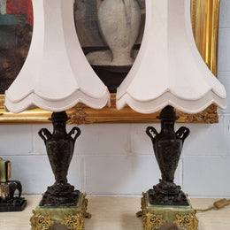 Pair of decorative Antique French gilt bronzed metal and marble table lamps. In good original detailed working condition.