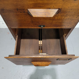 Blackwood four drawer filing cabinet in good original detailed condition.