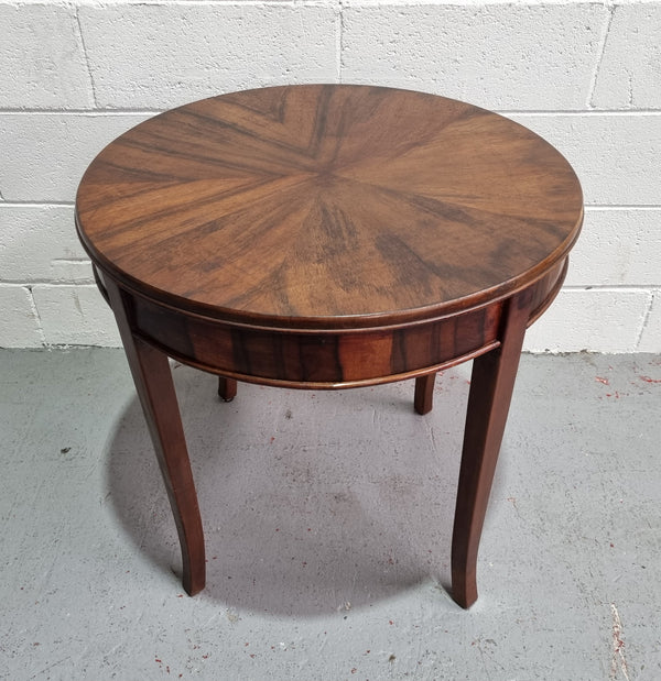 Round Art Deco Coffee Table with veneered top.  In good original condition.