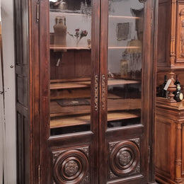 Substantial French Henry 2nd Walnut two door bookcase. It has five fully adjustable shelves and has been sourced from France. It is in good original detailed condition.