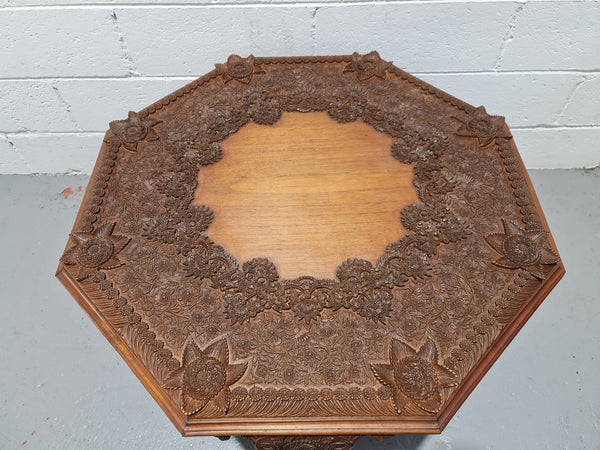 Heavily carved Teakwood round Chinese coffee table. In good original detailed condition. Circa: 1920