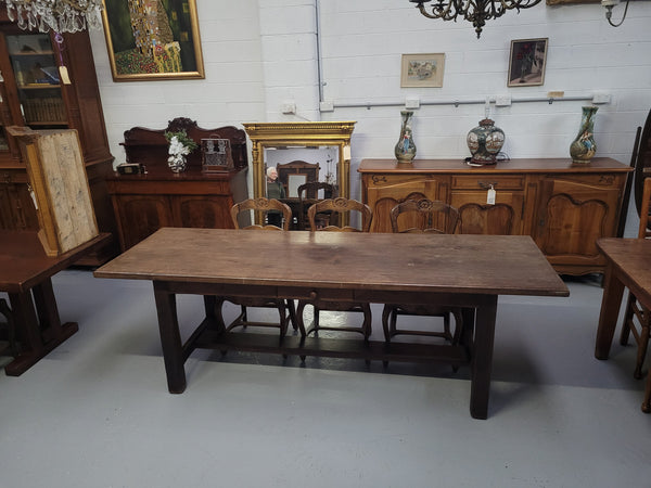 Antique French Oak single drawer pedestal base farmhouse table. The table top is in original condition and can be kept the way it is for a rustic look or finished for a completely different look. It has been sourced from France and is in original condition.
