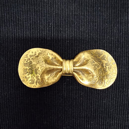Vintage gilt brass neck tie brooch in great original condition. Stamped 187. Please view photos as they help form part of the description.