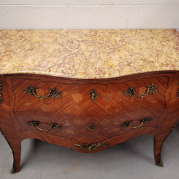 Stunning Louis XV style two drawer marquetry inlaid marble top commode. Made from Kingwood and has highly decorative beautiful ormolu mounts. It has been sourced from France and is in good original detailed condition.