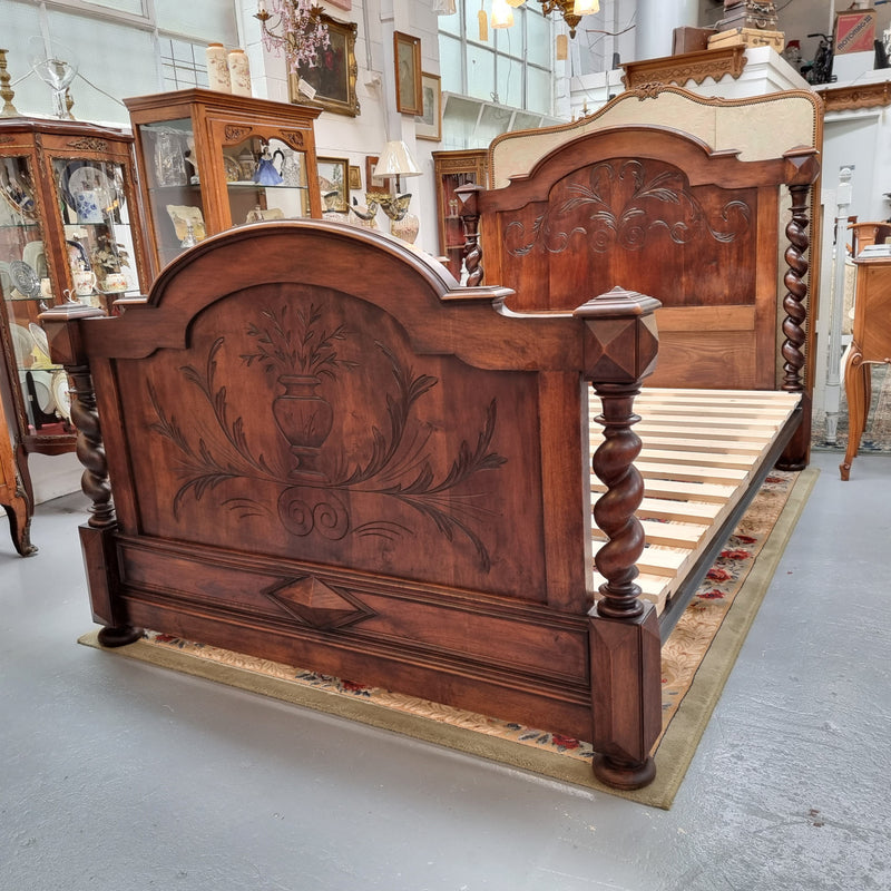 French 19th Century Walnut Henry II style queen sized bed with Barley Twist posts. Bed comes complete with custom made slats. Just place your mattress on top. In good original detailed condition.