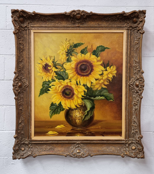 French signed oil on canvas depicting sunflowers in an attractive gilt frame. It is in good original detailed condition and has been sourced from France.