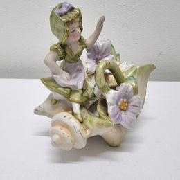Charming Art Nouveau figural group. It has been sourced locally and is in good original condition. Please see pictures to form part of the description.