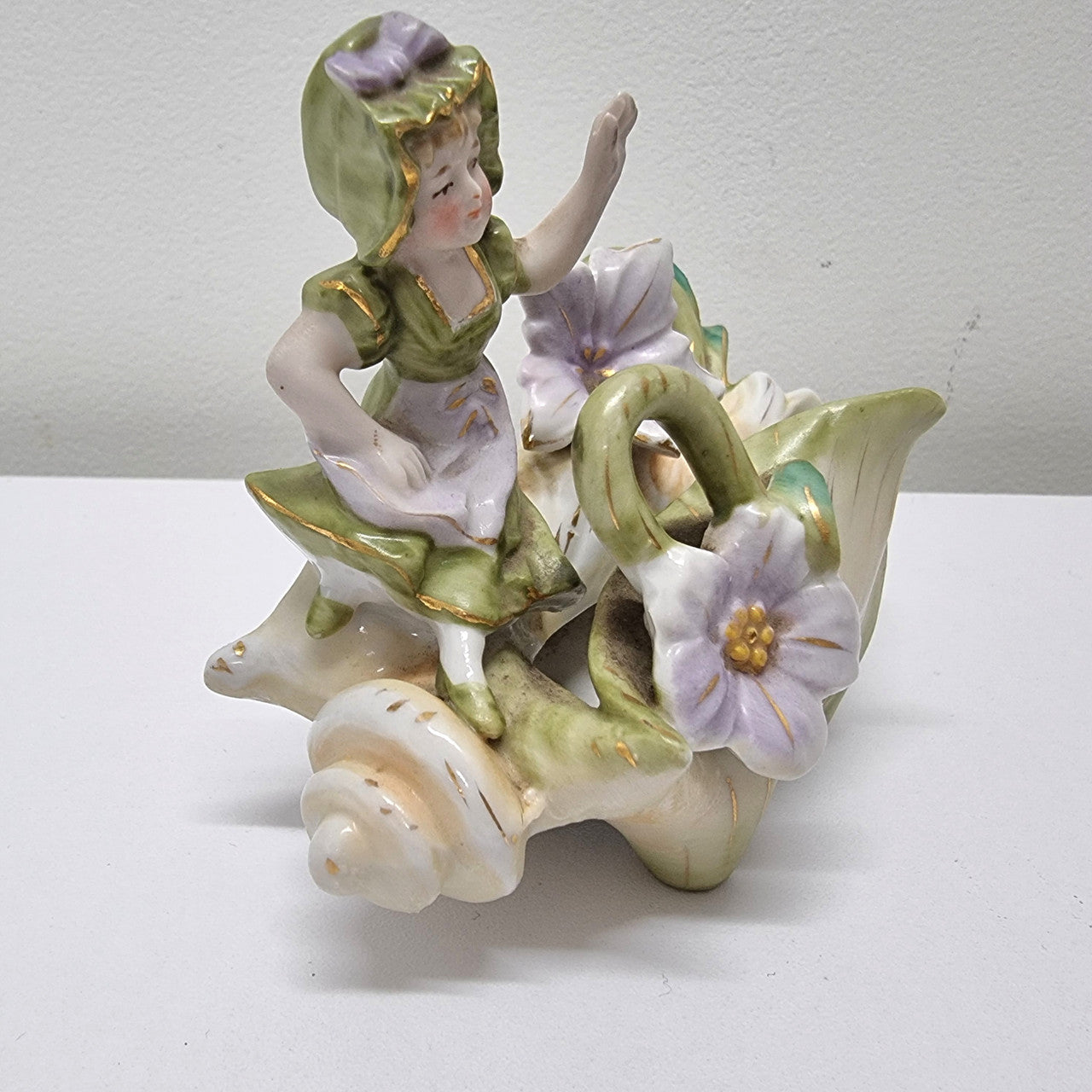 Charming Art Nouveau figural group. It has been sourced locally and is in good original condition. Please see pictures to form part of the description.