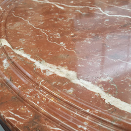 A superb early 19th century French Louis Philippe mahogany centre table, with original round carved rough marble with reeded-edge and is in good original condition.